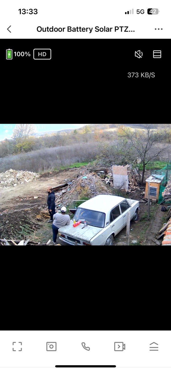 Cleared area and debris piles after shed demolition at the Kiten KOIVU site