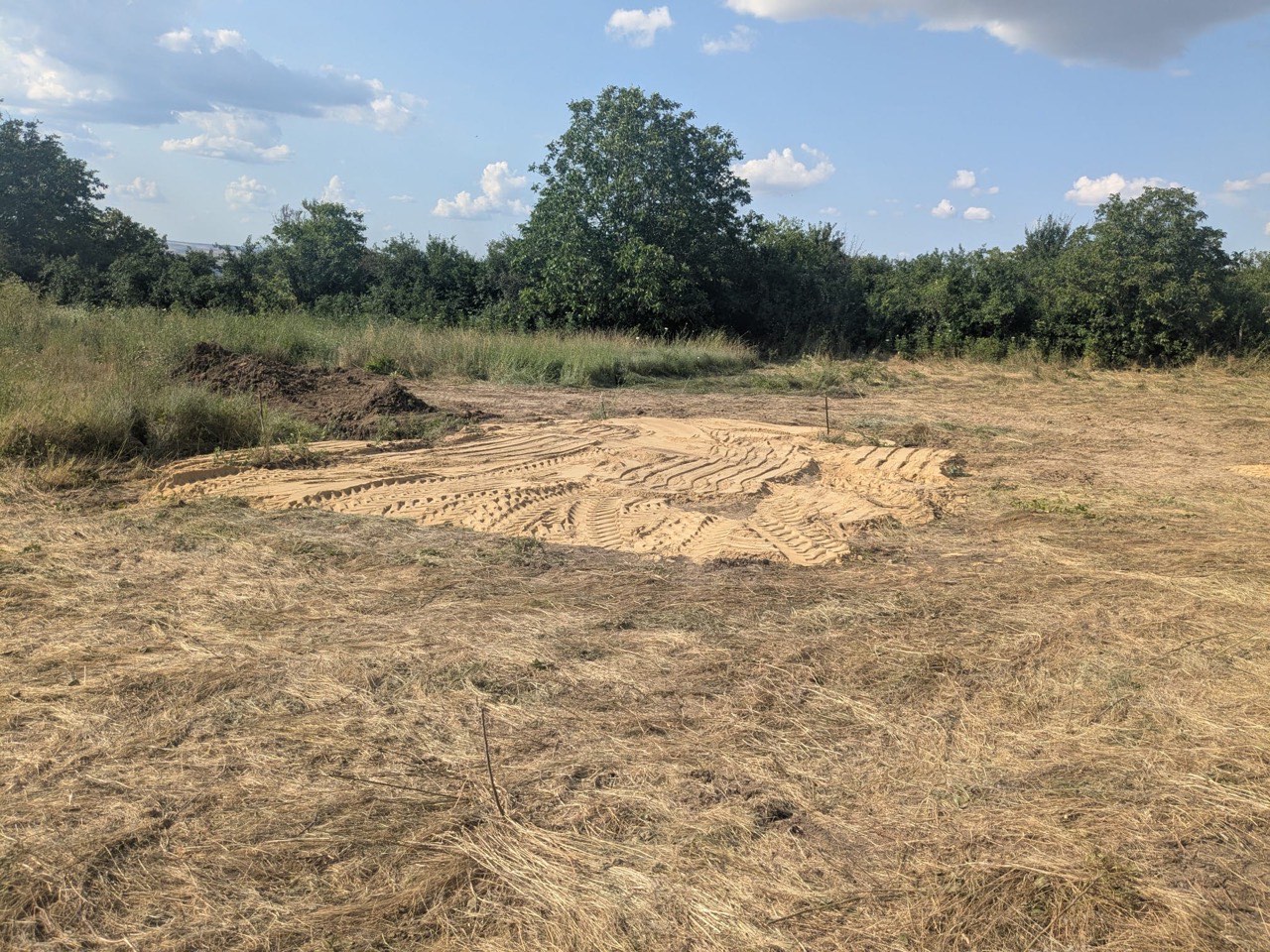 Prepared sand-covered house build spot on the Kiten KOIVU landplot